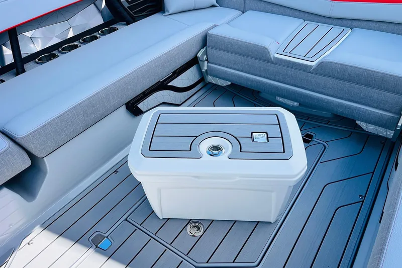 Slide: The Image of 2026 Nautique Super Air Nautique G25 interior with seating and storage compartment. - 66