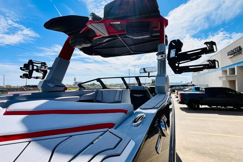 Slide: The Image of 2026 Nautique Super Air Nautique G25 boat with sleek design and modern features. - 83