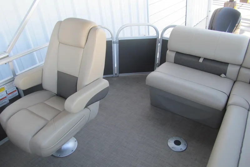 Slide: The Image of 2022 Sun Tracker Party Barge 20 DLX interior with plush seating and modern design. - 11