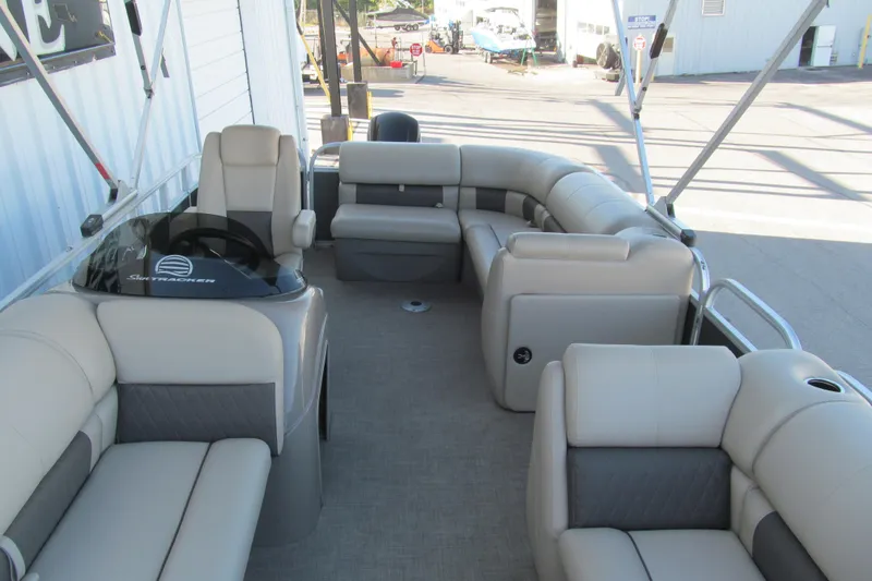 Slide: The Image of 2022 Sun Tracker Party Barge 20 DLX interior with spacious seating and modern design. - 9