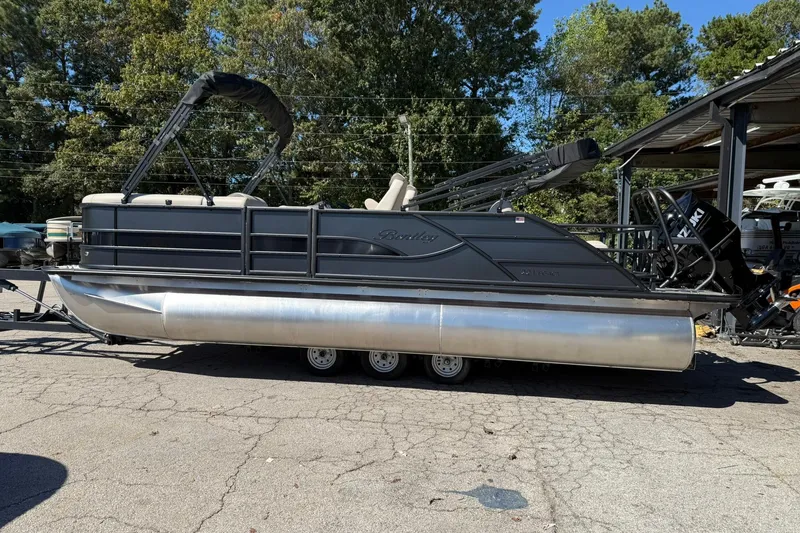 The Image of 2026 Bentley Pontoons Legacy 223 Swingback on trailer, parked outdoors. - 0