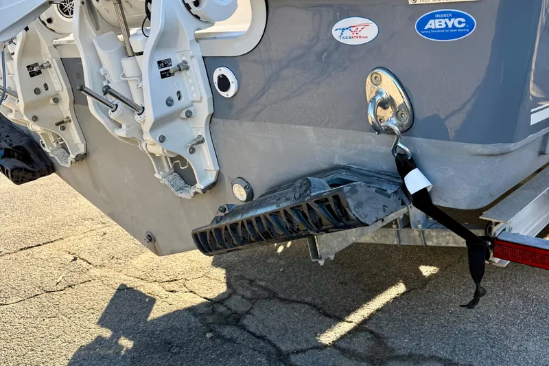 Slide: The Image of 2026 Tidewater 282 CC Adventure boat stern with trailer attachment. - 13