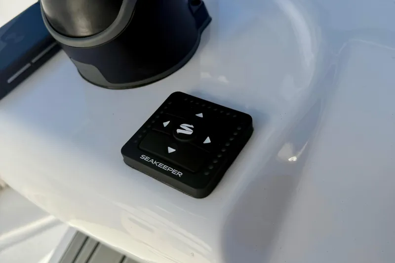 Slide: The Image of Seakeeper control panel on 2026 Tidewater 282 CC Adventure boat dashboard. - 32