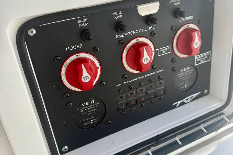 Slide: The Image of Control panel of 2026 Tidewater 282 CC Adventure boat with emergency switches. - 36
