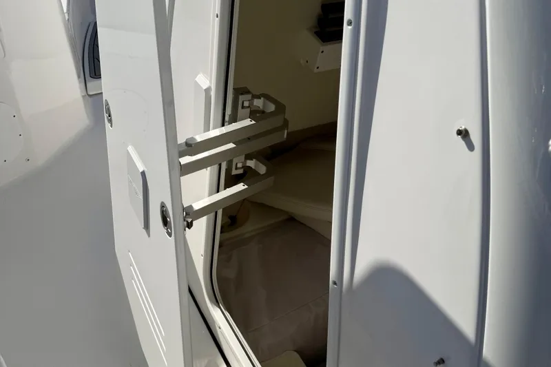 Slide: The Image of 2026 Tidewater 282 CC Adventure cabin door open, revealing interior space. - 39