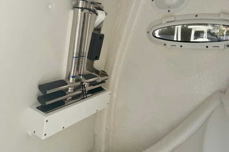 Slide: The Image of Interior view of 2026 Tidewater 282 CC Adventure boat, featuring stainless steel fixtures. - 40
