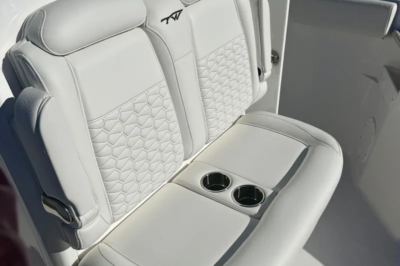 Slide: The Image of 2026 Tidewater 282 CC Adventure boat seat with cup holders and stylish upholstery. - 45