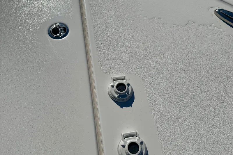 Slide: The Image of Close-up of 2026 Tidewater 282 CC Adventure boat deck fittings. - 53