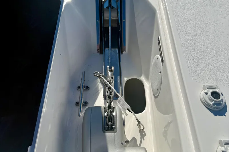 Slide: The Image of 2026 Tidewater 282 CC Adventure boat anchor chain and cleat detail. - 54