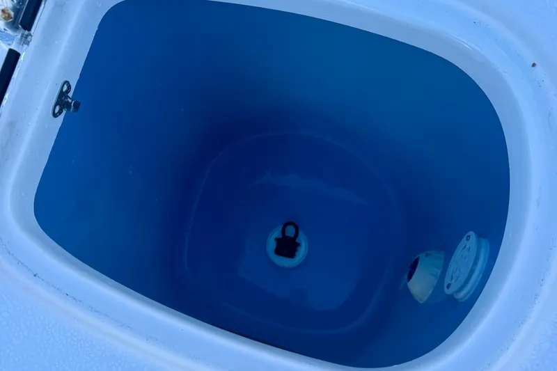 Slide: The Image of Livewell interior of 2026 Tidewater 282 CC Adventure boat. - 62