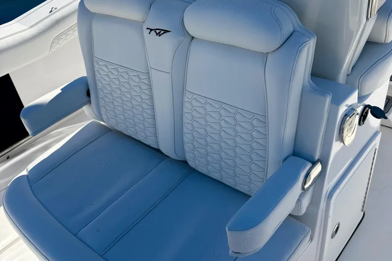 Slide: The Image of Luxurious seating on 2026 Tidewater 282 CC Adventure boat with stylish design. - 65