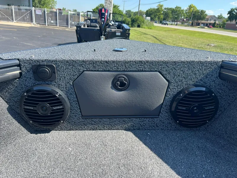 Slide: The Image of 2026 Lund 1875 Crossover XS dashboard with Rockford Fosgate audio system. - 19