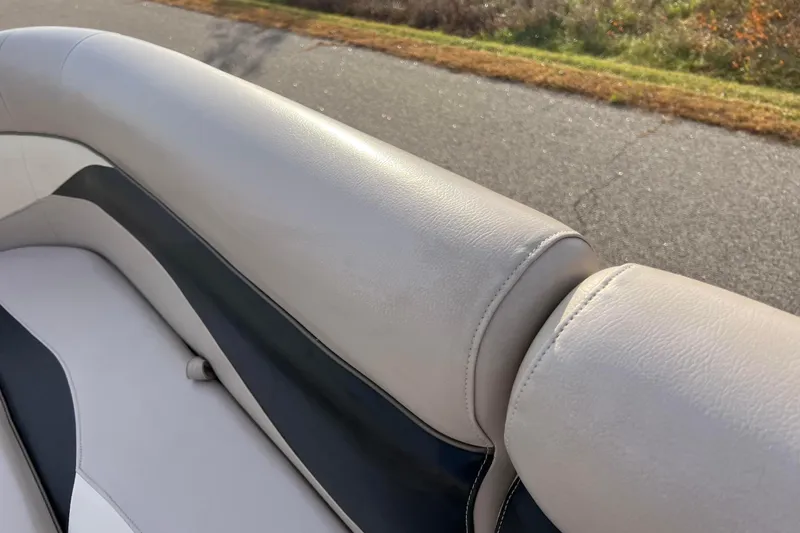 Slide: The Image of 2013 Godfrey Sweetwater 2286 boat seat with beige and black upholstery. - 36