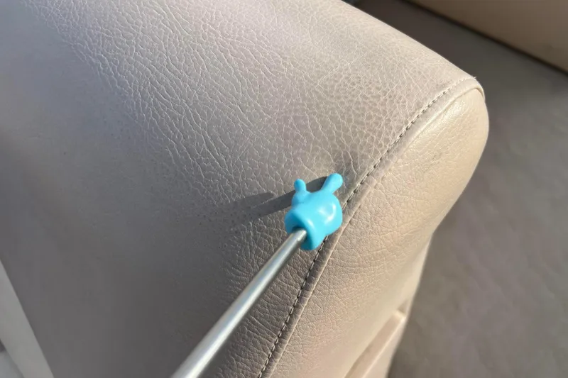 Slide: The Image of Blue tool on beige leather seat of 2013 Godfrey Sweetwater 2286 boat. - 44