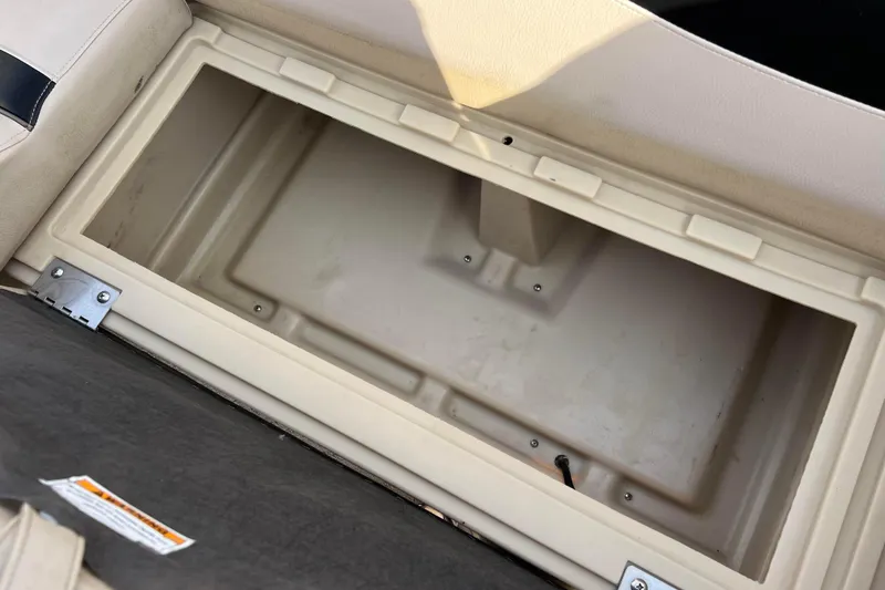 Slide: The Image of Storage compartment in a 2013 Godfrey Sweetwater 2286 boat, open and empty. - 53