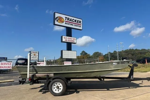 The Image of 1981 Lowe L1448 Jon boat on trailer at Tracker Boating Center. - 0