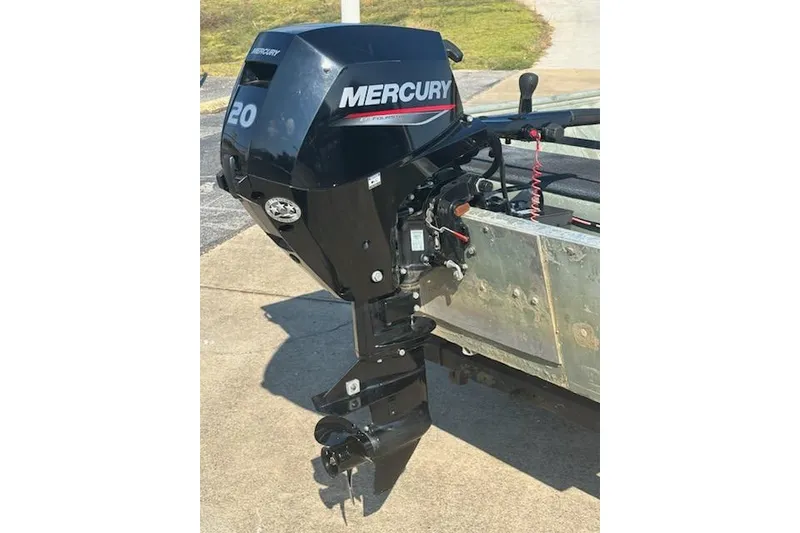 Slide: The Image of 1981 Lowe L1448 Jon boat with Mercury 20 HP outboard motor. - 5
