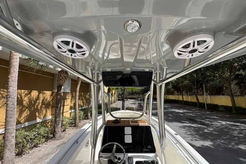 Slide: The Image of 2026 Bulls Bay 255CC boat interior with speakers and steering wheel, showcasing modern design. - 17