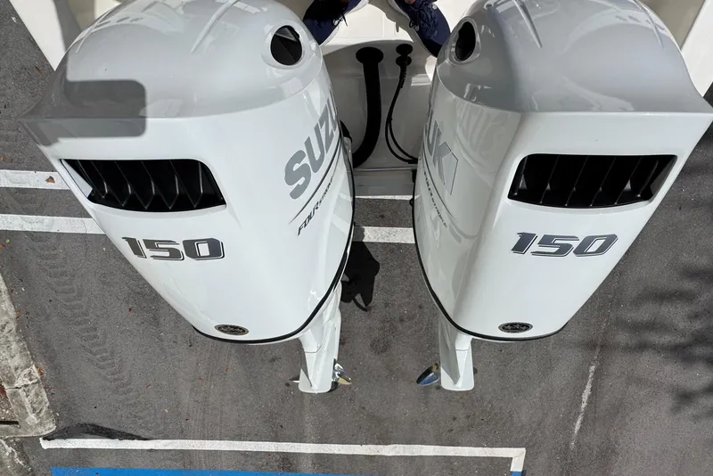Slide: The Image of Twin Suzuki 150 outboard engines on a 2026 Bulls Bay 255CC boat. - 6