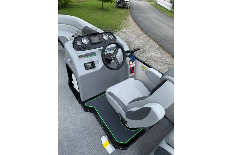 Slide: The Image of 2025 Veranda Vista Sport VS 22 RC boat cockpit with steering wheel and seating. - 5