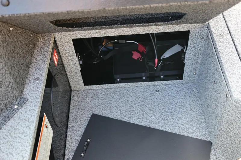 Slide: The Image of Interior view of 2026 Lund 1800 Explorer Sport boat compartment with wiring. - 27
