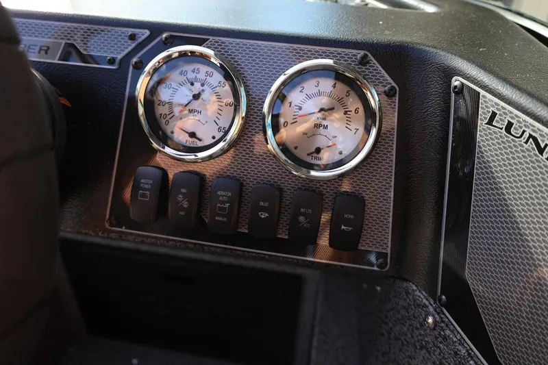 Slide: The Image of Dashboard of 2026 Lund 1800 Explorer Sport with speedometer and RPM gauges. - 31