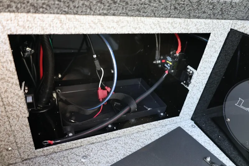 Slide: The Image of Interior wiring of 2026 Lund 1800 Explorer Sport boat, showcasing electrical components and connections. - 35