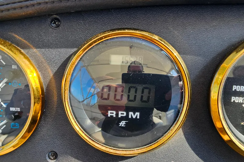 Slide: The Image of Close-up of a 2004 Carver 444 Cockpit Motor Yacht RPM gauge. - 20