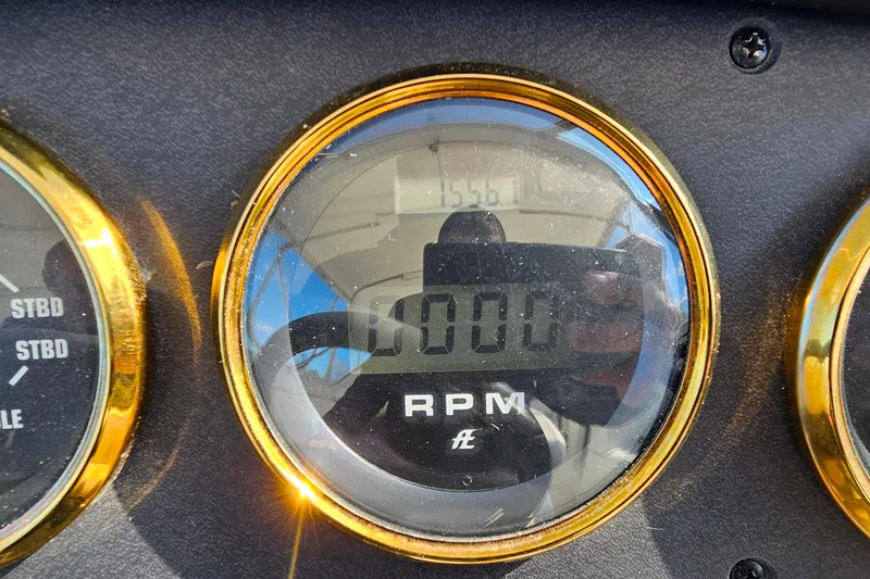 Slide: The Image of Close-up of 2004 Carver 444 Cockpit Motor Yacht RPM gauge. - 21