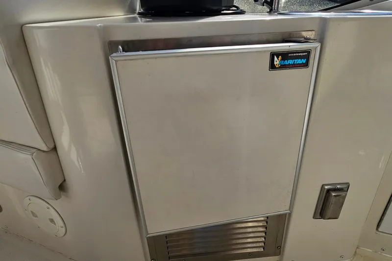 Slide: The Image of 2004 Carver 444 Cockpit Motor Yacht interior with Raritan appliance. - 25