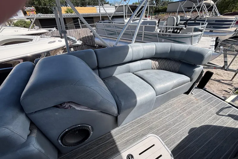 Slide: The Image of Luxurious seating on 2021 Premier 270 Intrigue RF pontoon boat, showcasing comfort and style. - 19
