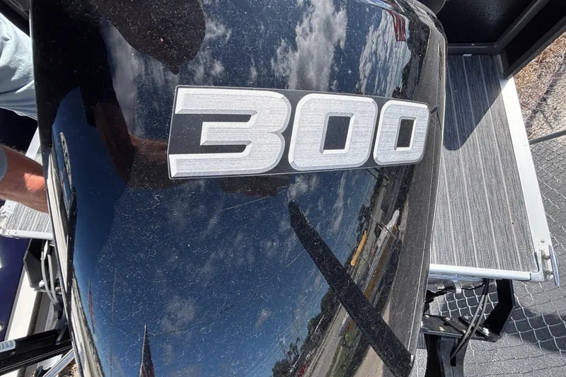 Slide: The Image of Close-up of 300 horsepower engine on 2021 Premier 270 Intrigue RF boat. - 27
