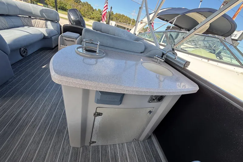 Slide: The Image of 2021 Premier 270 Intrigue RF boat interior with sink and seating area. - 33