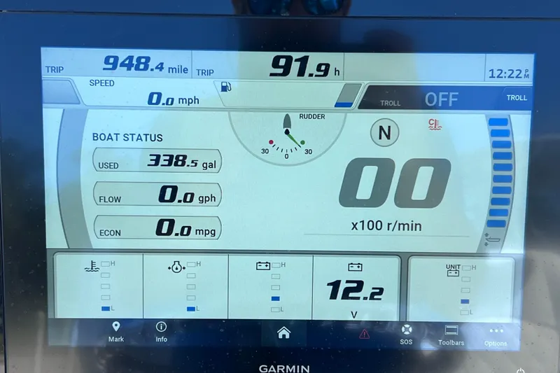 Slide: The Image of Display screen of 2023 Sportsman Open 242 Center Console showing trip data and boat status. - 24