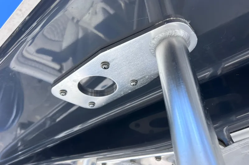 Slide: The Image of Close-up of 2023 Sportsman Open 242 Center Console metal fixture detail. - 29