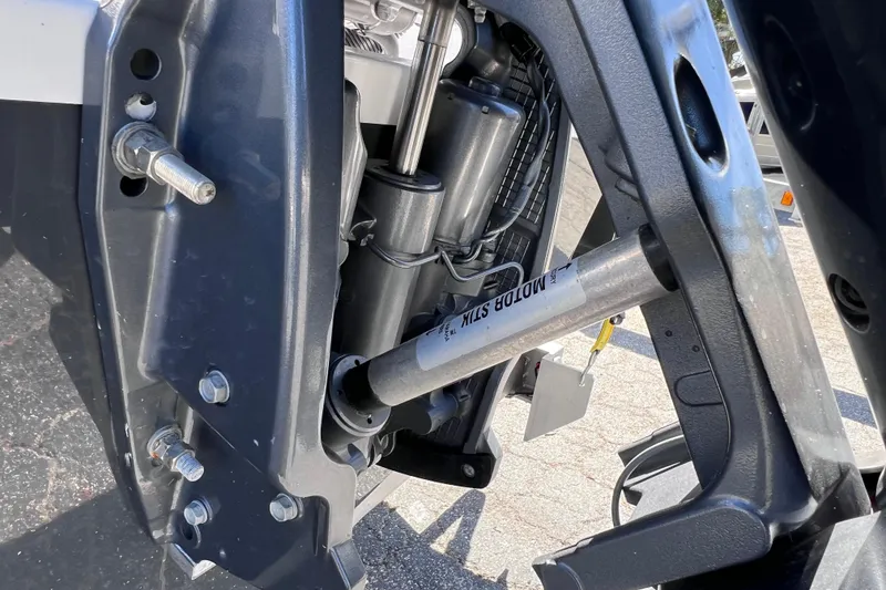 Slide: The Image of Close-up of 2023 Sportsman Open 242 Center Console boat motor mount and components. - 3
