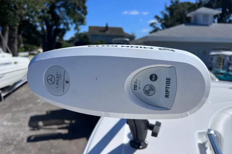 Slide: The Image of Minn Kota Riptide motor on 2023 Sportsman Open 242 Center Console boat. - 33