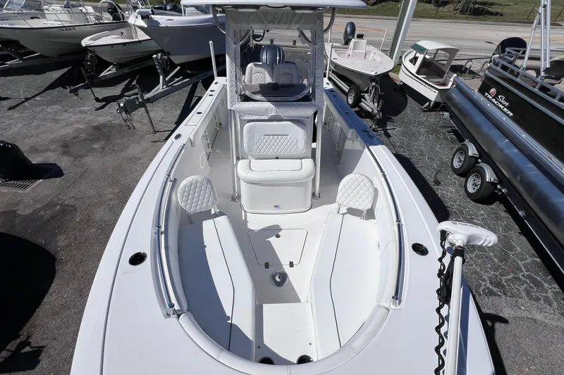 Slide: The Image of 2023 Sportsman Open 242 Center Console boat with spacious seating and modern design. - 35