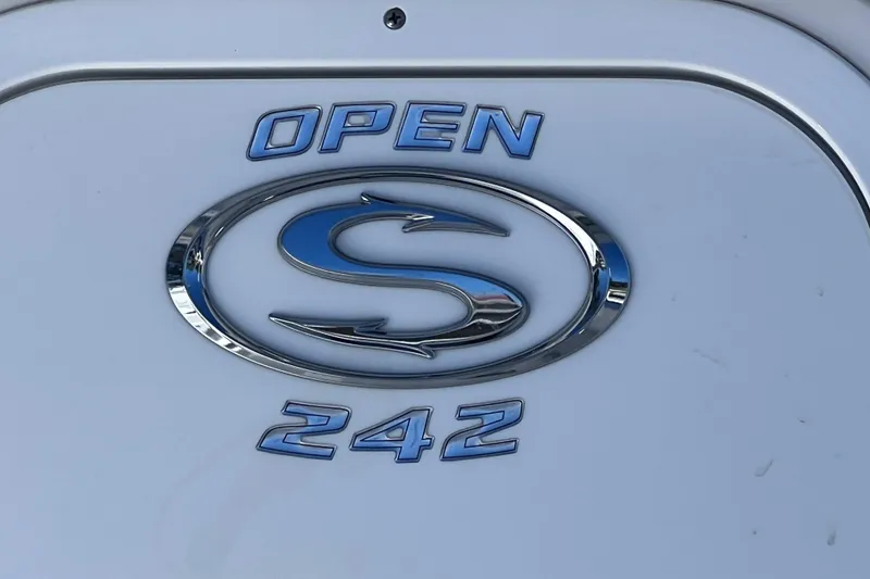 Slide: The Image of 2023 Sportsman Open 242 Center Console logo on boat exterior. - 6