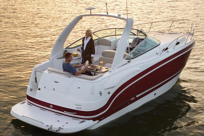 Slide: The Image of Manufacturer Provided Image: 2016 Chaparral 290 Signature boat on water with two people onboard. - 39