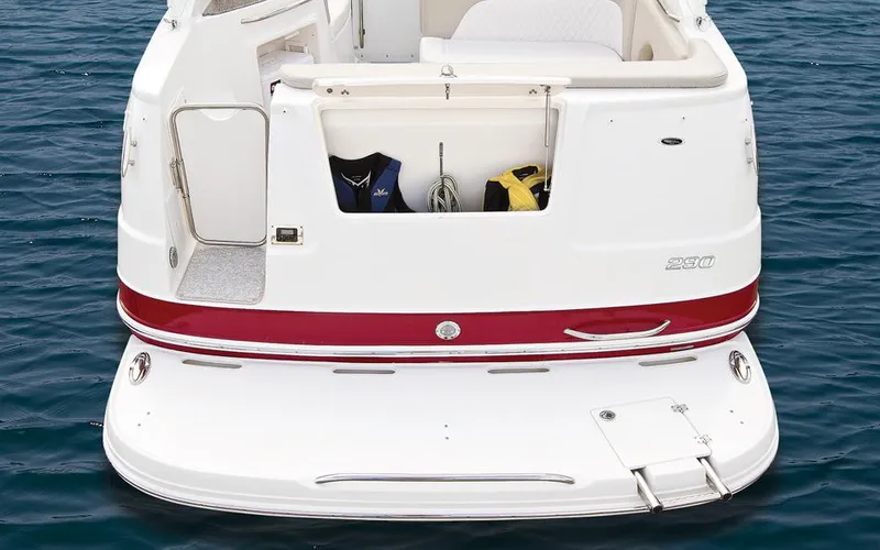 Slide: The Image of Manufacturer Provided Image: 2016 Chaparral 290 Signature boat stern view with swim platform and storage. - 44