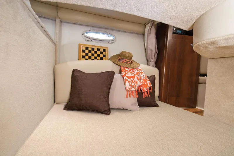 Slide: The Image of Manufacturer Provided Image: Interior cabin of 2016 Chaparral 290 Signature with cozy bedding and decor. - 47
