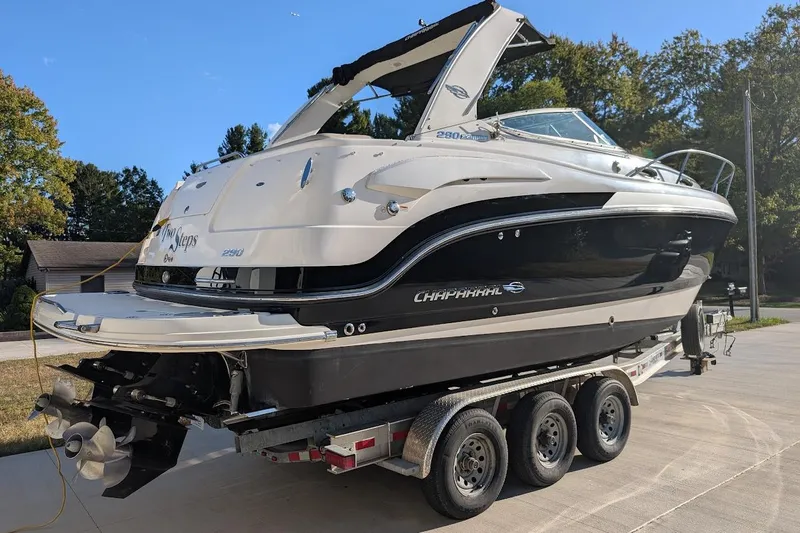 Slide: The Image of 2016 Chaparral 290 Signature boat on trailer, parked outdoors. - 5