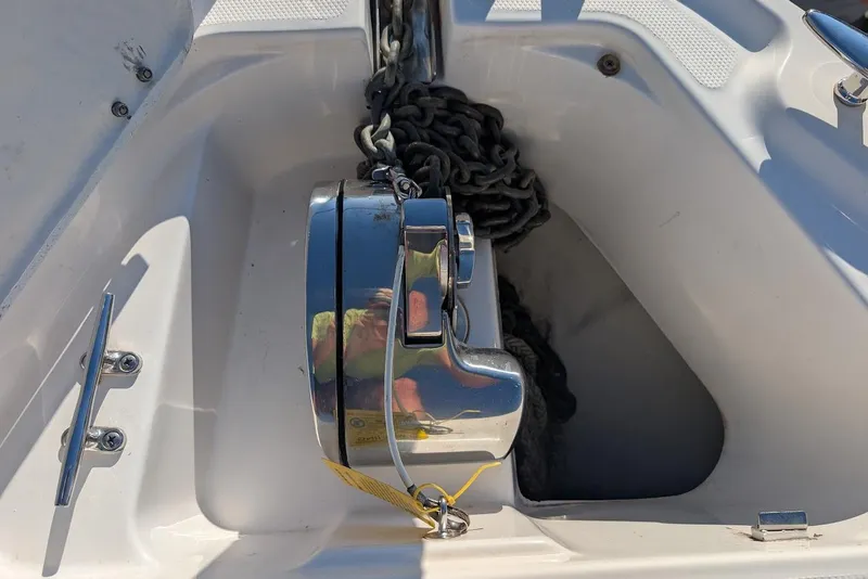 Slide: The Image of Anchor winch and chain on 2016 Chaparral 290 Signature boat deck. - 9