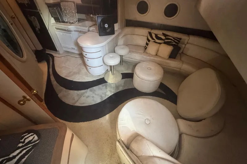 Slide: The Image of Luxurious interior of 1995 Sea Ray 500 Sundancer yacht with elegant seating and decor. - 11