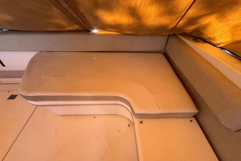 Slide: The Image of Interior seating area of a 1995 Sea Ray 500 Sundancer yacht. - 19