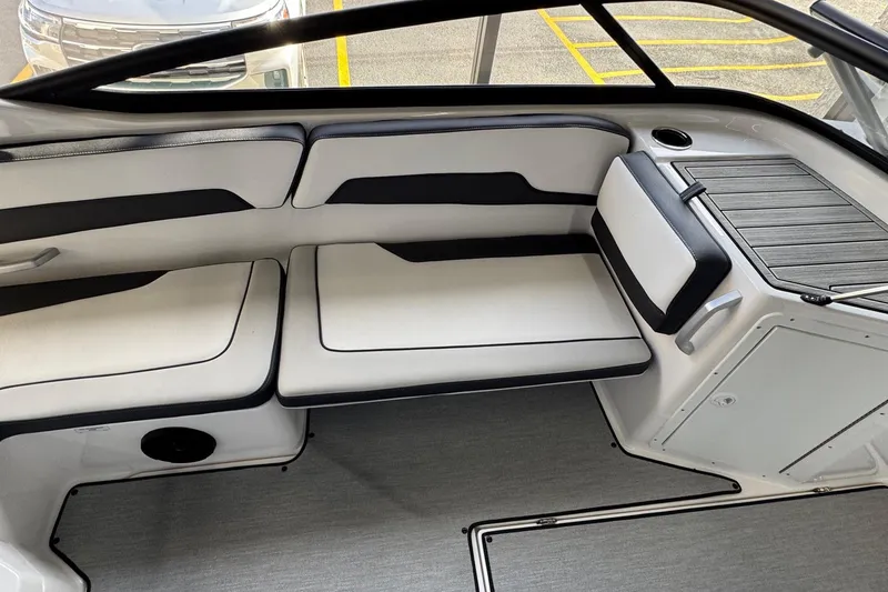 Slide: The Image of 2026 Yamaha Boats AR195 interior with sleek seating and modern design. - 10