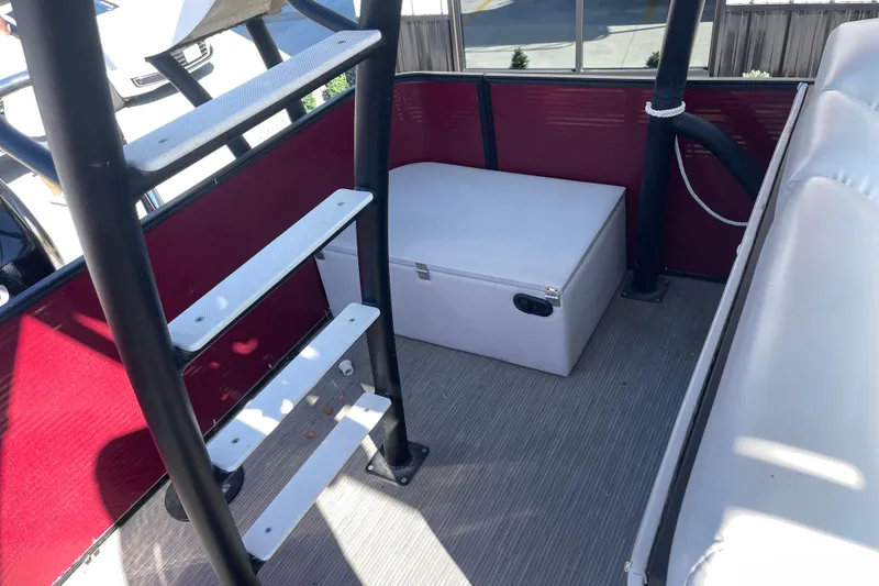 Slide: The Image of Interior of 2017 Godfrey Sweetwater 255 boat with ladder and storage box. - 13