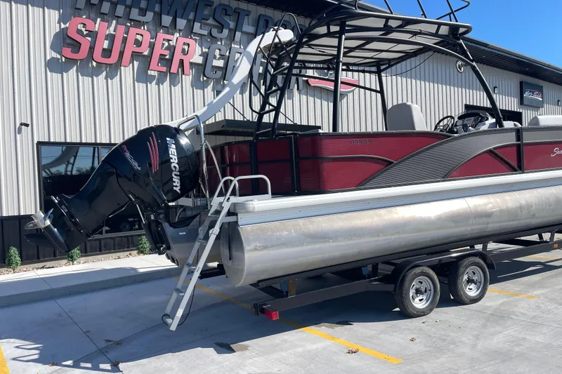 Slide: The Image of 2017 Godfrey Sweetwater 255 pontoon boat with Mercury engine on trailer. - 4