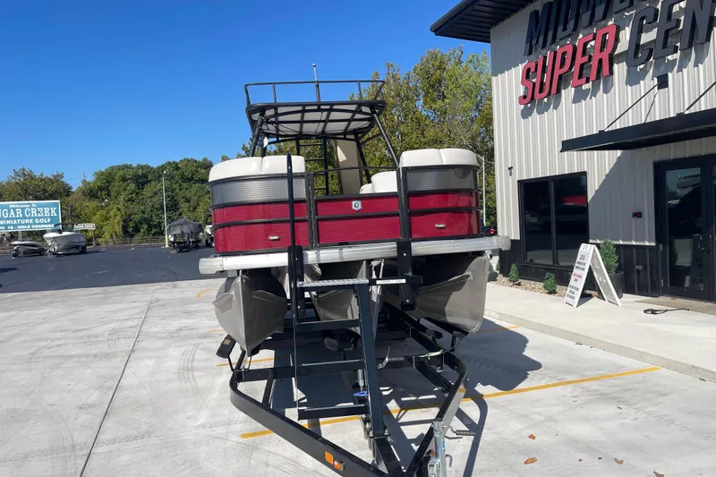 Slide: The Image of 2017 Godfrey Sweetwater 255 pontoon boat on trailer at dealership. - 9
